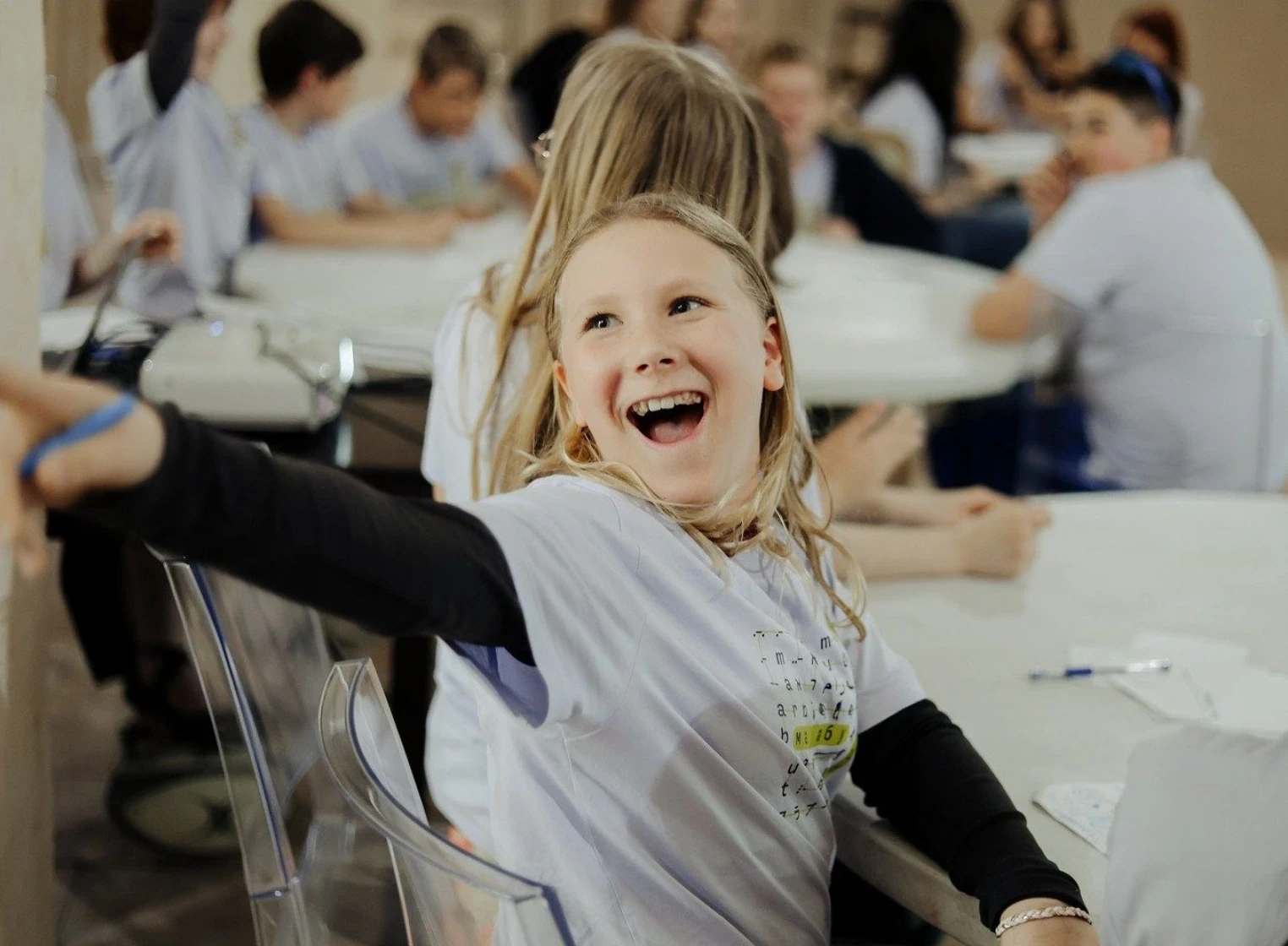 A smiling camper enjoying a math class